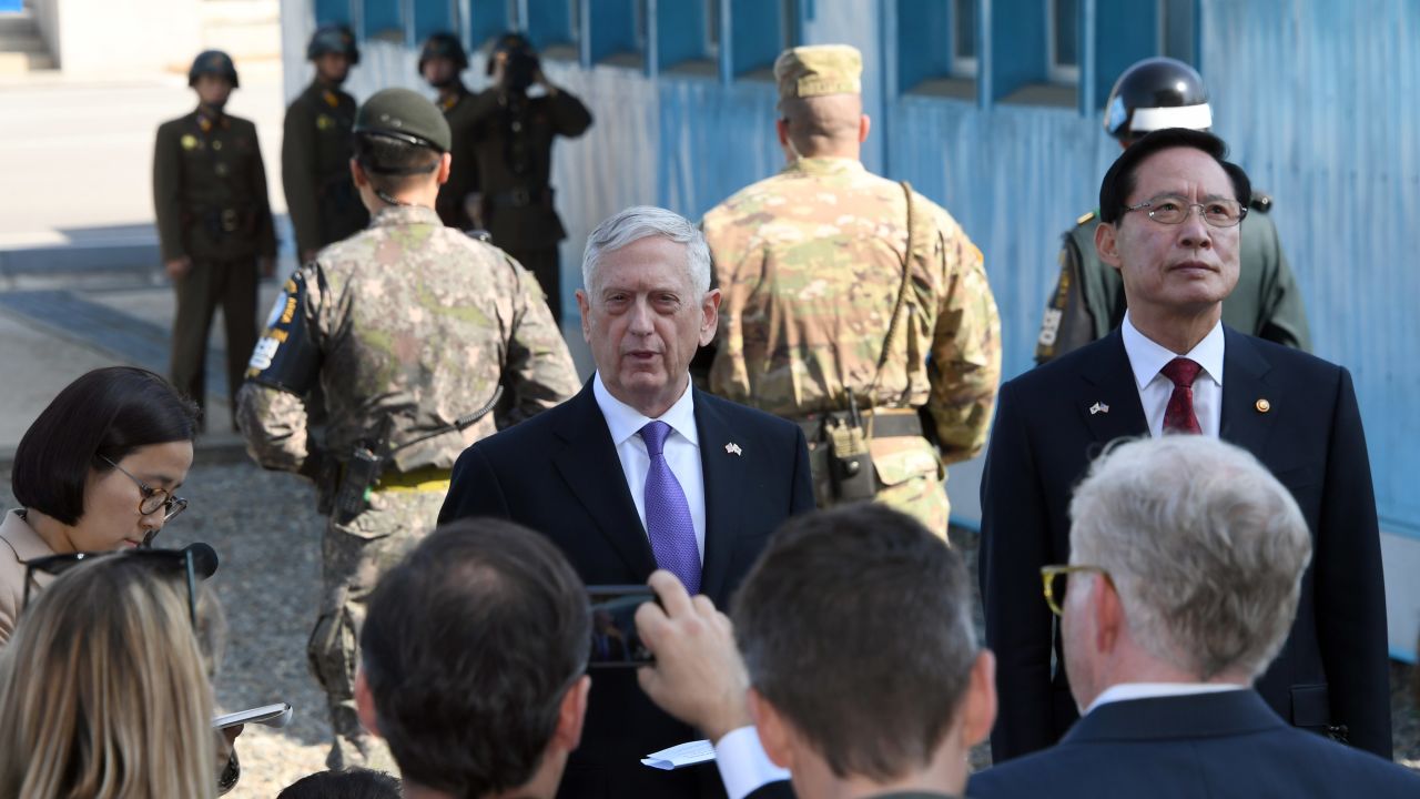 US Secretary of Defence Jim Mattis (C) speaks to the media as South Korean Defence Minister Song Young-Moo (R) looks on during a visit to the truce village of Panmunjom in the Demilitarized Zone (DMZ) on October 27, 2017.