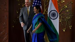Indian Foreign Minister Sushma Swaraj (R) and US Secretary of State Rex Tillerson walk together before a meeting in New Delhi on October 25, 2017.
US Secretary of State Rex Tillerson on October 25 started talks with Indian leaders expected to highlight the strong alliance between the two nations, with both anxious to counter China's growing influence. / AFP PHOTO / MONEY SHARMA        (Photo credit should read MONEY SHARMA/AFP/Getty Images)