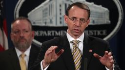 WASHINGTON, DC - OCTOBER 17:  Deputy U.S. Attorney General Rod Rosenstein (R) speaks as Acting DEA Administrator Robert Patterson (L) listens during a news conference October 17, 2017 at the Justice Department in Washington, DC. Rosenstein held a news conference to announce that federal grand juries in the Southern District of Mississippi and the District of North Dakota have indicted two Chinese nationals and their North American based traffickers and distributors for separate conspiracies to distribute large quantities of fentanyl and fentanyl analogues and other opiate substances in the U.S.
  (Photo by Alex Wong/Getty Images)
