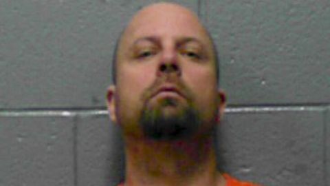 Todd Boyes appears in an undated mugshot. He is described as a 5-foot-6-inch white male, weighing 220 pounds.