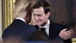 US President Donald Trump (L) congratulates his son-in-law and senior advisor Jared Kushner after the swearing-in of senior staff in the East Room of the White House on January 22, 2017 in Washington, DC. / AFP / MANDEL NGAN (Photo credit should read MANDEL NGAN/AFP/Getty Images)