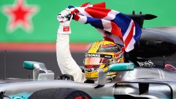 Lewis Hamilton celebrates at the Mexican Grand Prix after winning a fourth F1 drivers' title