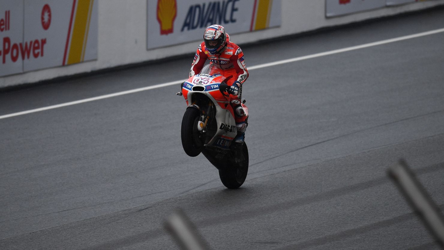 Ducati's Andrea Dovizioso celebrates winning the Malaysia MotoGP.