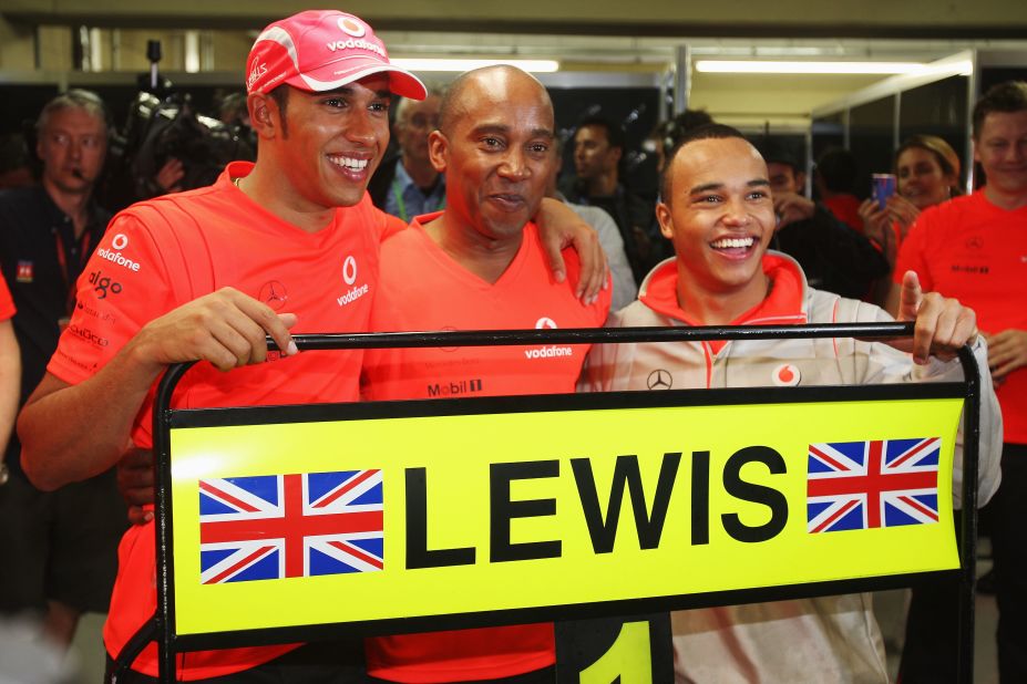 The Briton's first triumph came in only his second season in the sport. Hamilton is seen here celebrating with his father, Anthony (left) and brother Nick after winning the 2008 world drivers' title with McLaren.