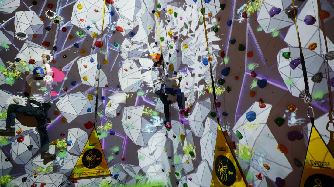 Not all of the rides are strictly VR -- the "Niagra Drop Trap Climbing" attraction is a climbing wall that uses projection mapping to suggest an alternate location.