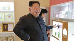 This undated picture released from North Korea's official Korean Central News Agency (KCNA) on October 29, 2017 shows North Korean leader Kim Jong-Un (C) inspecting the Pyongyang Cosmetics Factory. / AFP PHOTO / KCNA VIA KNS / STR / South Korea OUT / REPUBLIC OF KOREA OUT   ---EDITORS NOTE--- RESTRICTED TO EDITORIAL USE - MANDATORY CREDIT "AFP PHOTO/KCNA VIA KNS" - NO MARKETING NO ADVERTISING CAMPAIGNS - DISTRIBUTED AS A SERVICE TO CLIENTS
THIS PICTURE WAS MADE AVAILABLE BY A THIRD PARTY. AFP CAN NOT INDEPENDENTLY VERIFY THE AUTHENTICITY, LOCATION, DATE AND CONTENT OF THIS IMAGE. THIS PHOTO IS DISTRIBUTED EXACTLY AS RECEIVED BY AFP.  /         (Photo credit should read STR/AFP/Getty Images)