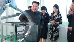 This undated picture released from North Korea's official Korean Central News Agency (KCNA) on October 29, 2017 shows North Korean leader Kim Jong-Un (L) inspecting the Pyongyang Cosmetics Factory, as his wife Ri Sol-Ju (2nd R) looks on. / AFP PHOTO / KCNA VIA KNS / STR / South Korea OUT / REPUBLIC OF KOREA OUT   ---EDITORS NOTE--- RESTRICTED TO EDITORIAL USE - MANDATORY CREDIT "AFP PHOTO/KCNA VIA KNS" - NO MARKETING NO ADVERTISING CAMPAIGNS - DISTRIBUTED AS A SERVICE TO CLIENTS
THIS PICTURE WAS MADE AVAILABLE BY A THIRD PARTY. AFP CAN NOT INDEPENDENTLY VERIFY THE AUTHENTICITY, LOCATION, DATE AND CONTENT OF THIS IMAGE. THIS PHOTO IS DISTRIBUTED EXACTLY AS RECEIVED BY AFP.  /         (Photo credit should read STR/AFP/Getty Images)