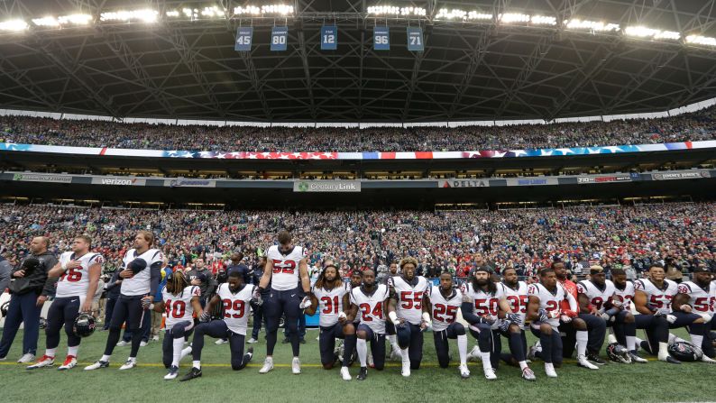Members of the NFL's Houston Texans kneel during the National Anthem in Seattle on Sunday, October 29. Many Texans were upset with team owner Bob McNair, who had <a href="index.php?page=&url=http%3A%2F%2Fwww.espn.com%2Fespn%2Fotl%2Fstory%2F_%2Fid%2F21170410%2Fgaffes-tv-ratings-concerns-dominated-nfl-players-forged-anthem-peace-league-meetings" target="_blank" target="_blank">been quoted by ESPN</a> as saying that the league shouldn't have "inmates running the prison" over<a href="index.php?page=&url=http%3A%2F%2Fwww.cnn.com%2Finteractive%2F2017%2F09%2Fus%2Fnfl-anthem-protests-cnnphotos%2F" target="_blank"> anthem protests.</a> McNair <a href="index.php?page=&url=https%3A%2F%2Fwww.si.com%2Fnfl%2F2017%2F10%2F27%2Fhouston-texans-bob-mcnair-nfl-protests-inmates" target="_blank" target="_blank">later apologized</a> for using those words, saying it was a figure of speech not intended to be taken literally or to refer to players.