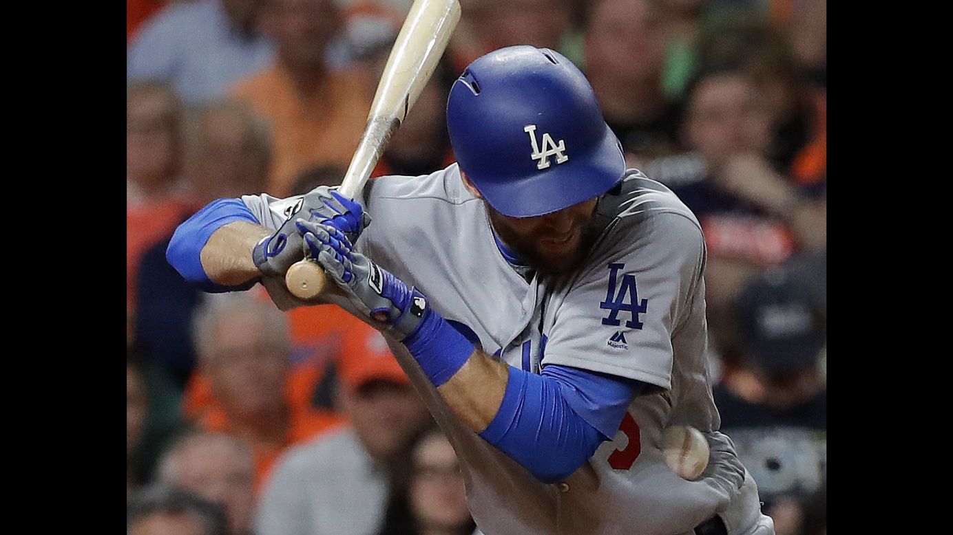 Chris Taylor is hit by a pitch during Game 5 of the World Series on Sunday, October 29. He stayed in the game.