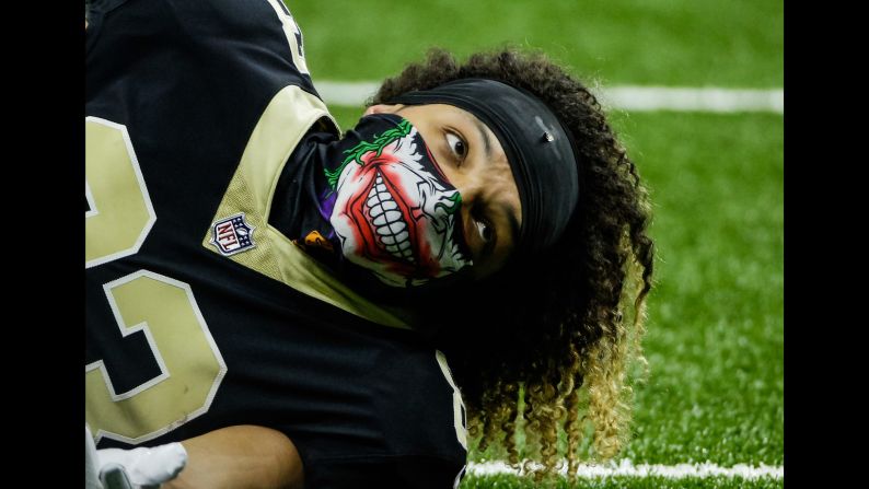 New Orleans wide receiver Willie Snead wears a Joker mask before an NFL game against Chicago on Sunday, October 29.