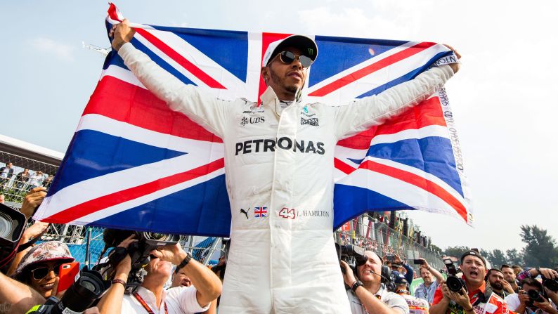 Lewis Hamilton celebrates <a target="_blank">his fourth Formula One title</a> at the end of the Mexican Grand Prix on Sunday, October 29. The British driver is now part of an elite group that has won at least four F1 titles.