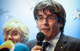 Catalonia's dismissed leader Carles Puigdemont addresses reporters in Brussels last month. 