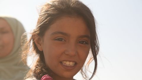 Nine-year-old Haneen would venture out, braving ISIS and airstrikes, to find food for her family. 