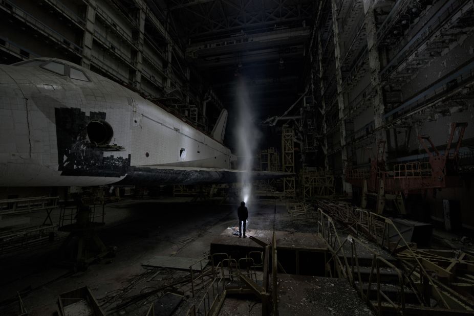 "Space Dust. An enigmatic long exposure next to OK-MT. It reminds me of the first time I entered the hangar. I wasn't sure of what I'd discover. When I saw the nose of the shuttle, I couldn't believe it!"