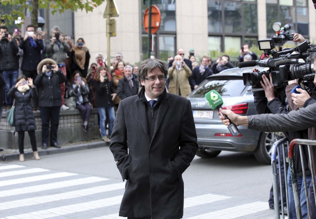 Sacked Catalonian President Carles Puigdemont arrives for a press conference in Brussels on Tuesday.