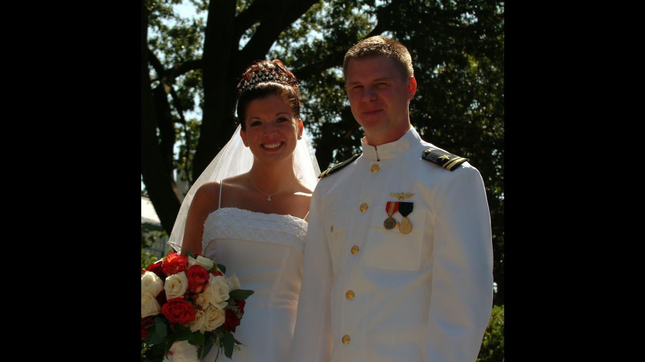 Theresa and Landon Jones celebrate their wedding day in 2003 at the US Naval Academy. 