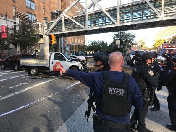 New York City police work in Manhattan after a rental truck drove down a busy bicycle path and struck people on Tuesday, October 31. At least eight people were killed in the incident, which is being investigated as terrorism, according to multiple law enforcement sources. A suspect is in custody.