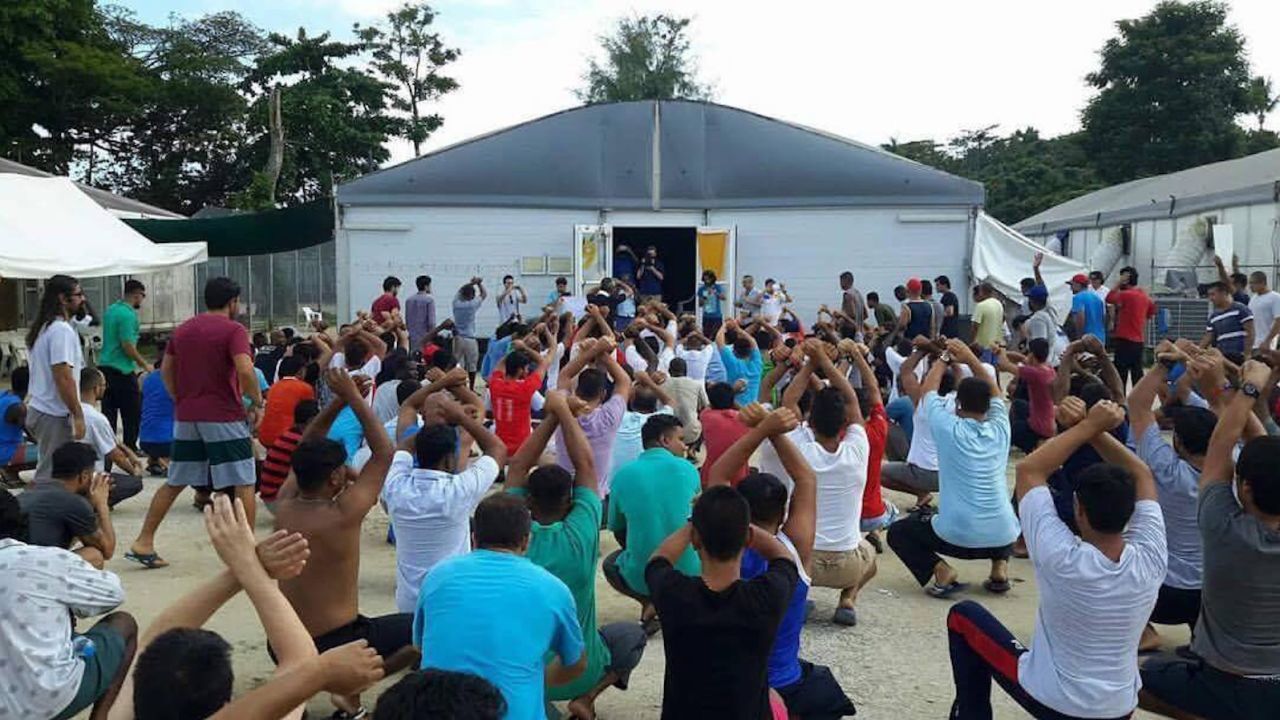 Refugees and asylum seekers protest in the ground of the Manus Island detention center, Tuesday, October 31. 