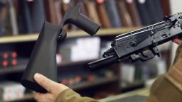 SALT LAKE CITY, UT - OCTOBER 5: A bump stock device (left), that fits on a semi-automatic rifle to increase the firing speed, making it similar to a fully automatic rifle, is shown next to a AK-47 semi-automatic rifle (right), at a gun store on October 5, 2017 in Salt Lake City, Utah. Congress is talking about banning this device after it was reported to of been used in the Las Vegas shootings on October 1, 2017.  (Photo by George Frey/Getty Images)