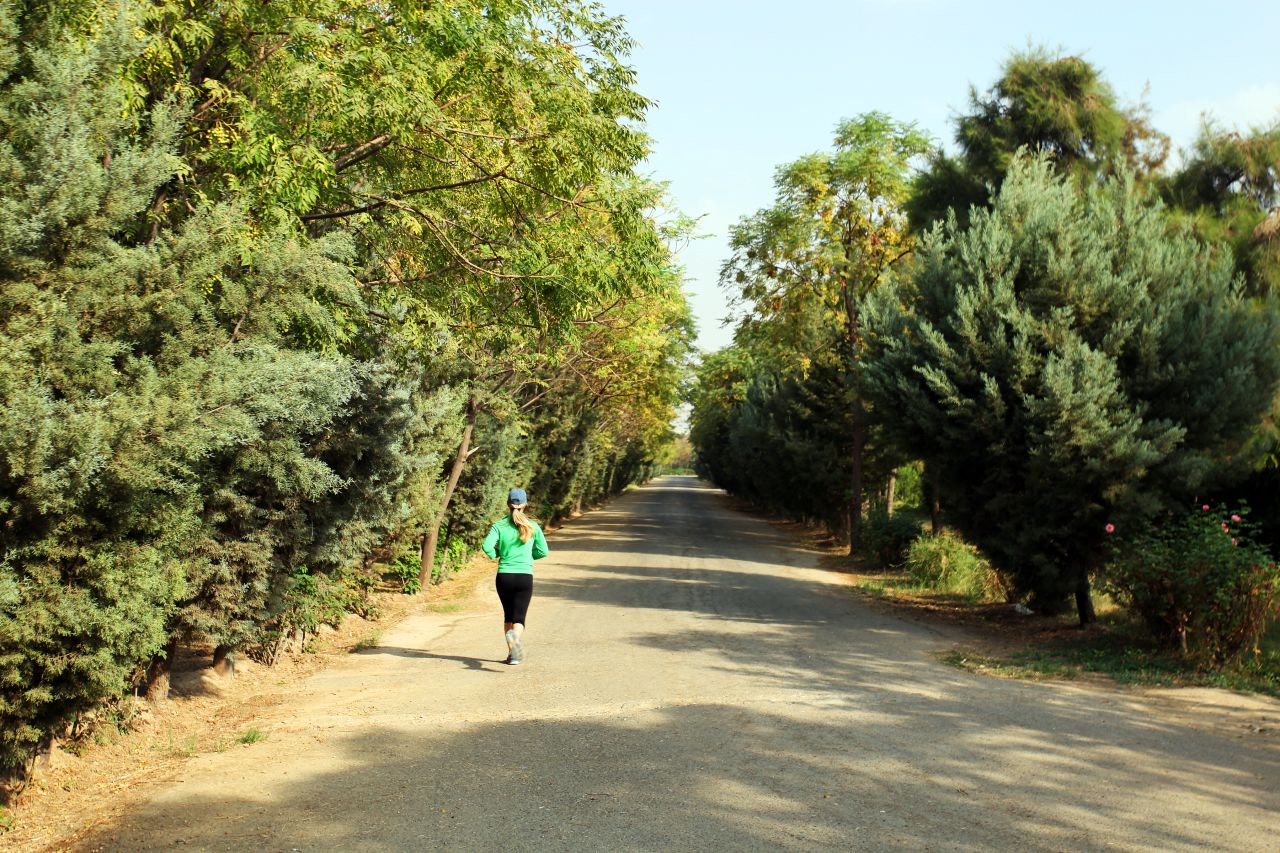 A woman runs through Erbil's spacious Sami Abdulrahman Park.