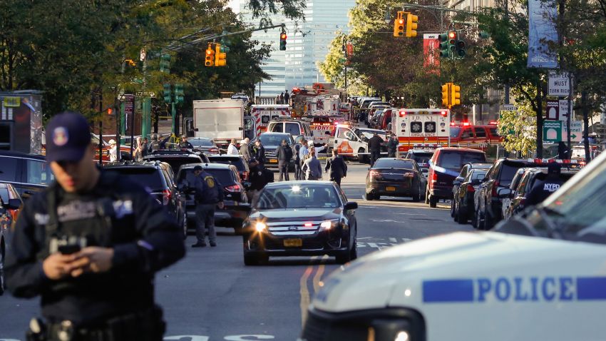 NEW YORK, NY - OCTOBER 31: NYPD officers respond after reports of multiple people hit by a truck after it plowed through a bike path in lower Manhattan on October 31, 2017 in New York City. According to reports up to six people may have been killed. (Photo by Kena Betancur/Getty Images)