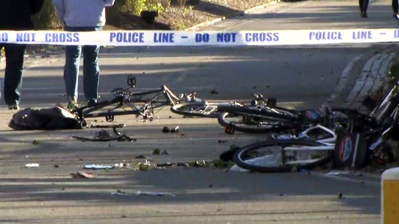 Parts of mangled bikes are strewn on the ground in Manhattan on Tuesday.