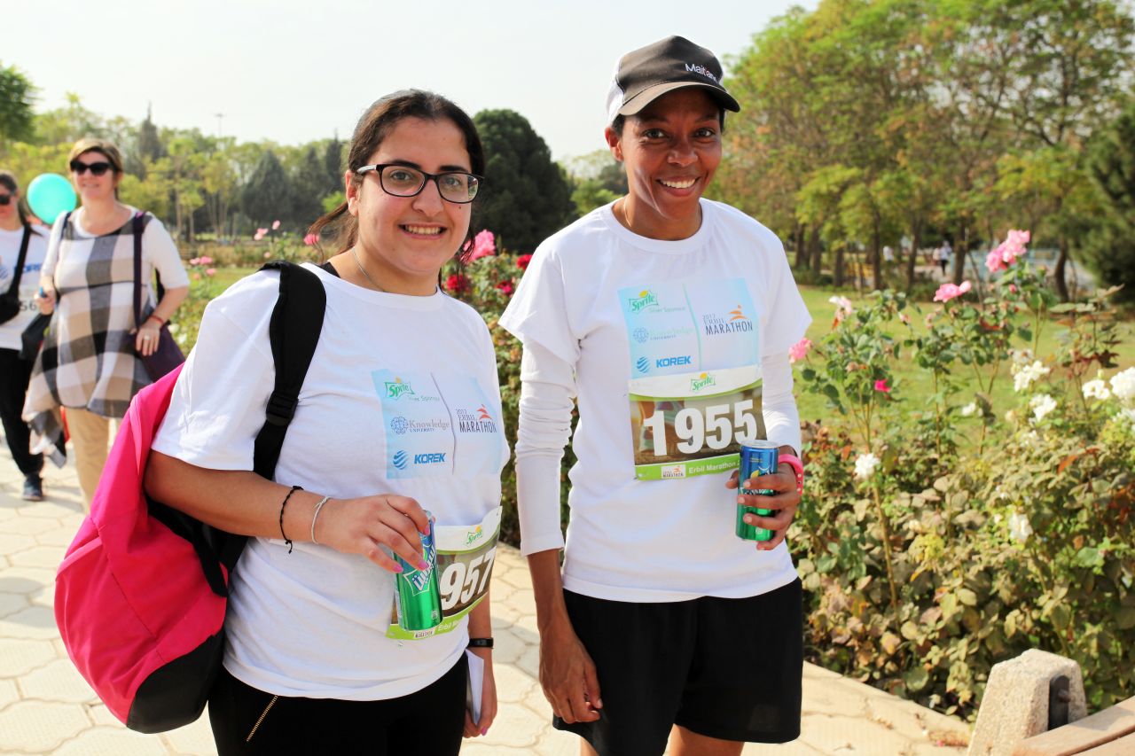 Teachers at a local international school, from Zimbabwe and Lebanon, head to the party after the race.