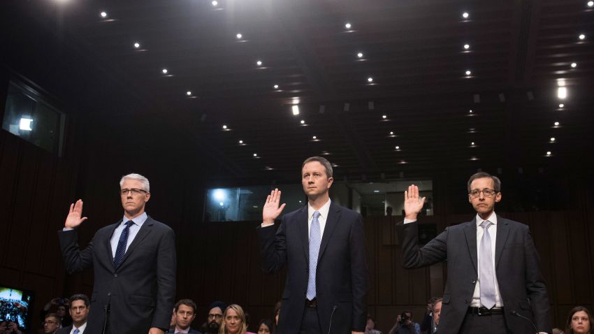 Colin Stretch (L), General Counsel of Facebook, Sean Edgett (C), Acting General Counsel of Twitter, and Richard Salgado (R), Director of Law Enforcement And Information Security of Google, are sworn in prior to testifying during a US Senate Judiciary Subcommittee on Crime and Terrorism hearing on Russian influence on social networks on Capitol Hill in Washington, DC, October 31, 2017. / AFP PHOTO / SAUL LOEB (Photo credit should read SAUL LOEB/AFP/Getty Images)