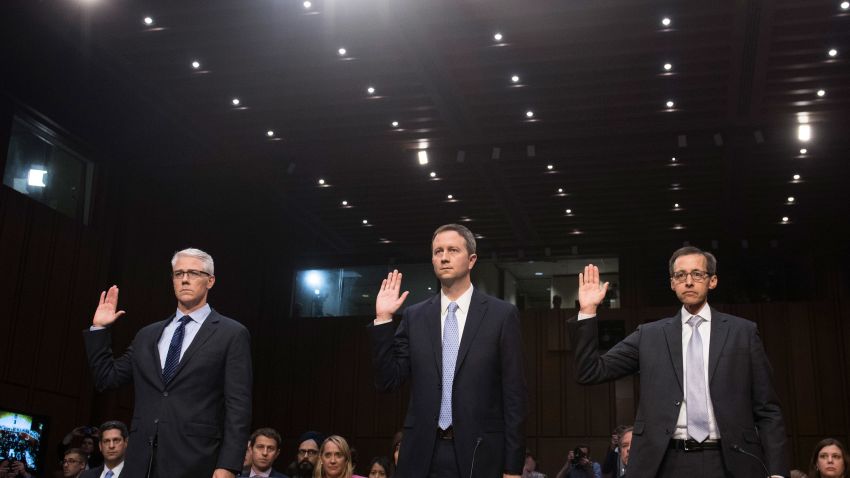 Colin Stretch (L), General Counsel of Facebook, Sean Edgett (C), Acting General Counsel of Twitter, and Richard Salgado (R), Director of Law Enforcement And Information Security of Google, are sworn in prior to testifying during a US Senate Judiciary Subcommittee on Crime and Terrorism hearing on Russian influence on social networks on Capitol Hill in Washington, DC, October 31, 2017. / AFP PHOTO / SAUL LOEB        (Photo credit should read SAUL LOEB/AFP/Getty Images)