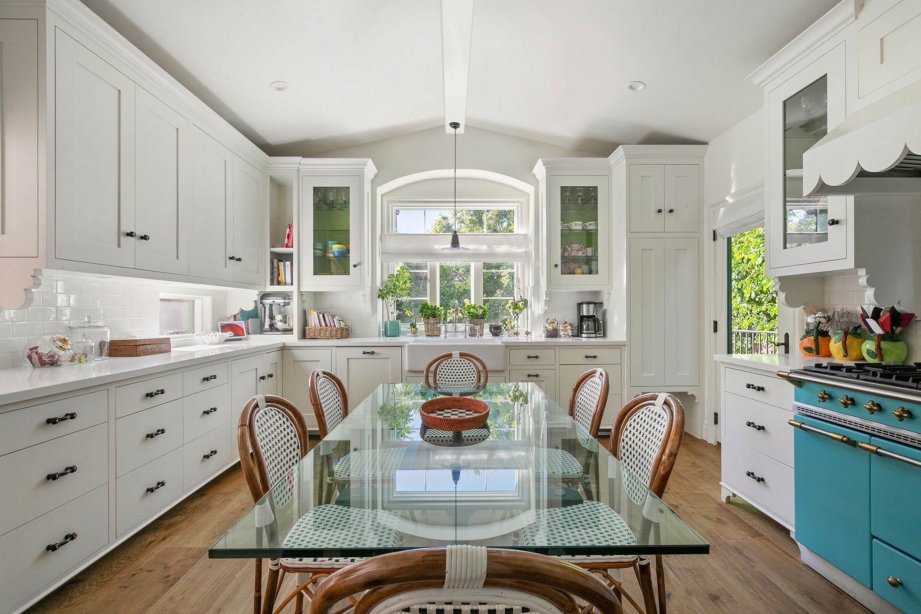 Stone expanded the vaulted kitchen with eat-in dining.