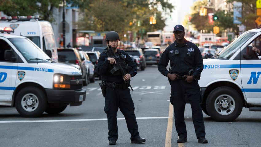 Police secure an area following a shooting incident in New York on October 31, 2017.
Several people were killed and numerous others injured in New York when a suspect plowed a vehicle into a bike and pedestrian path in Lower Manhattan, and struck another vehicle on Halloween, police said. A suspect exited the vehicle holding up fake guns, before being shot by police and taken into custody, officers said.
 / AFP PHOTO / Don EMMERTDON EMMERT/AFP/Getty Images