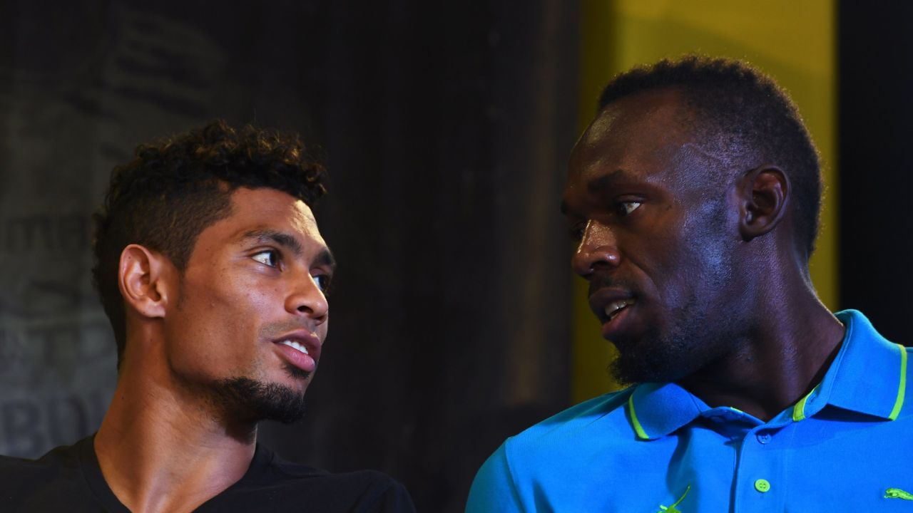 Usain Bolt of Jamaica (R) chats with Wayde Van Niekerk of South Africa during a press conference in Kingston, on June 8, 2017. 
Jamaican sprinter Usain Bolt said he is looking forward to having a party as he launches his final season on June 10 with what will be his last race on Jamaican soil.
The 30-year-old world's fastest man plans to retire from track and field after the 2017 London World Championships in August.
 
 / AFP PHOTO / Jewel SAMAD        (Photo credit should read JEWEL SAMAD/AFP/Getty Images)