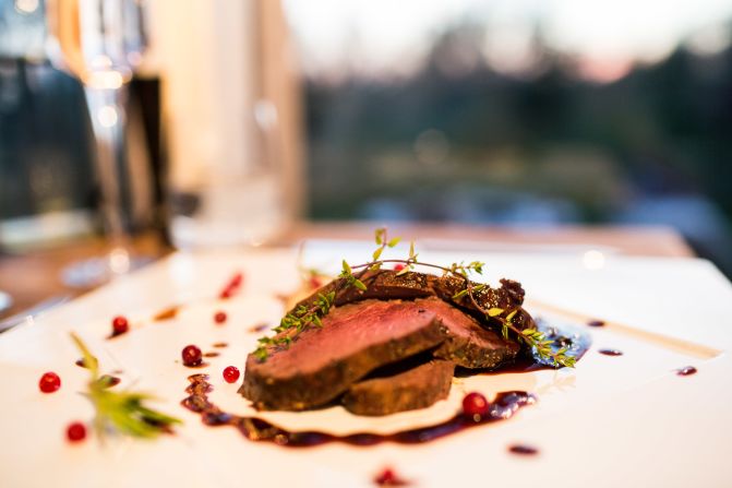 <strong>Arctic Gourmet Cabin:</strong> A third cabin is home to a four-seat gourmet restaurant. Owners Johan and Malin L?fgren met while working in the restaurant of the famed Icehotel.