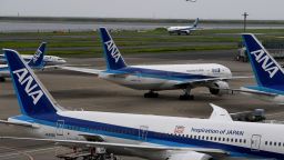 All Nippon Airways (ANA) jetliners are seen on the tarmac and taxiway at Haneda international airport in Tokyo on August 2, 2017.
Japan's All Nippon Airways is expected to release its April-June earnings results on August 2.  / AFP PHOTO / Toshifumi KITAMURA        (Photo credit should read TOSHIFUMI KITAMURA/AFP/Getty Images)