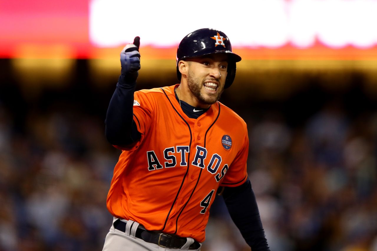 George Springer celebrates after hitting a home run to give the Astros a 5-0 lead in the second inning. The two-run blast was Springer's fifth home run of the series, tying a World Series record. He was later named World Series MVP. 