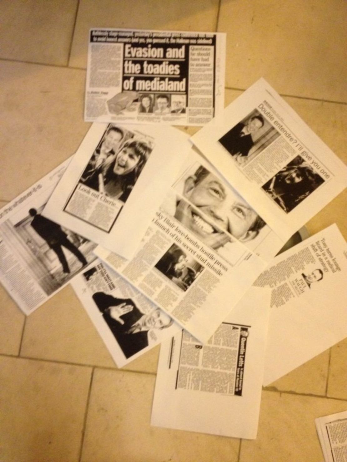Cuttings from British newspapers following the press conference with Tony Blair. 
