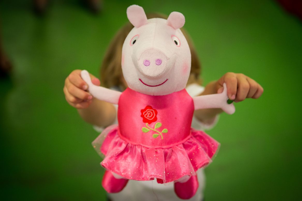 This cartoon television series aimed at young children follows Peppa, her family and friends as they play in the mud, snort, and go about their daily lives.<br /><br />The program is shown in 180 countries. There is a heap of "Peppa Pig" merchandise on the market, from stuffed toys to video games and even food, clothing and jewelry.<br /><br />There is even a dedicated Peppa Pig World within a family theme park in Hampshire, England, with over 60 Peppa-themed attractions. Milan, Italy,  is home to another attraction, Il Mondo Di Peppa Pig, in a theme park.