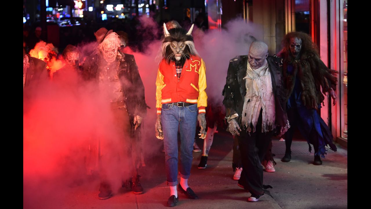 Supermodel Heidi Klum, dressed as a werewolf, performs a dance from Michael Jackson's "Thriller" video at her Halloween party in New York City on Tuesday, October 31.