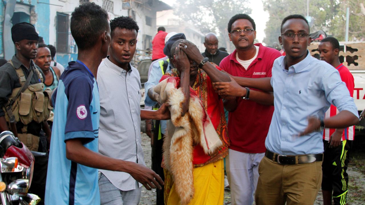 People help a man who was injured during a car bombing in Mogadishu, Somalia, on Saturday, October 28. <a href="http://www.cnn.com/2017/10/28/africa/somalia-mogadishu-bombings/index.html" target="_blank">At least 27 people were killed</a> when two car bombs detonated outside a hotel near Somalia's presidential palace, according to Security Minister Mohamed Abukar Islow. The blasts occurred two weeks after the deadliest car bombings in the nation's modern history.