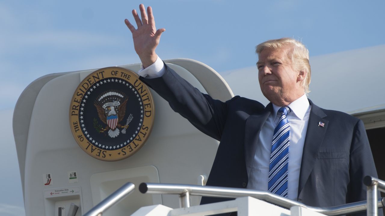 US President Donald Trump disembarks from Air Force One upon arrival at Tri-State Airport in Huntington, West Virginia, August 3, 2017, as he travels to a Make America Great Again Rally. / AFP PHOTO / SAUL LOEB        (Photo credit should read SAUL LOEB/AFP/Getty Images)