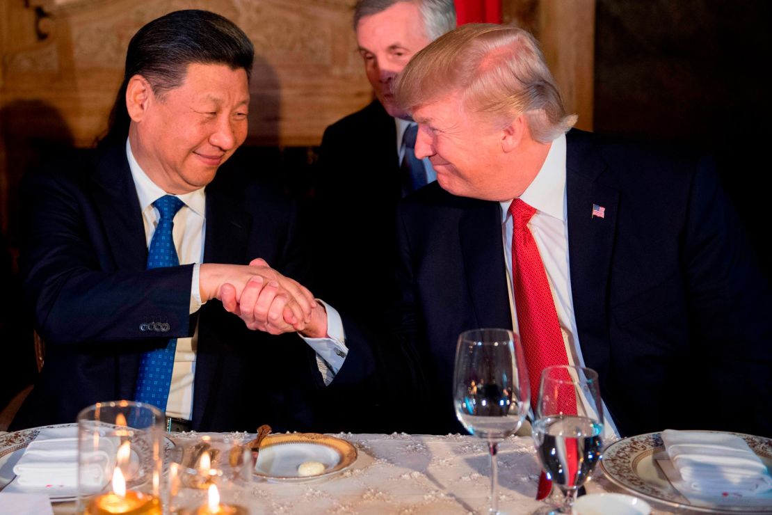 US President Donald Trump and Xi Jinping shake hands during dinner at the Mar-a-Lago estate on April 6.