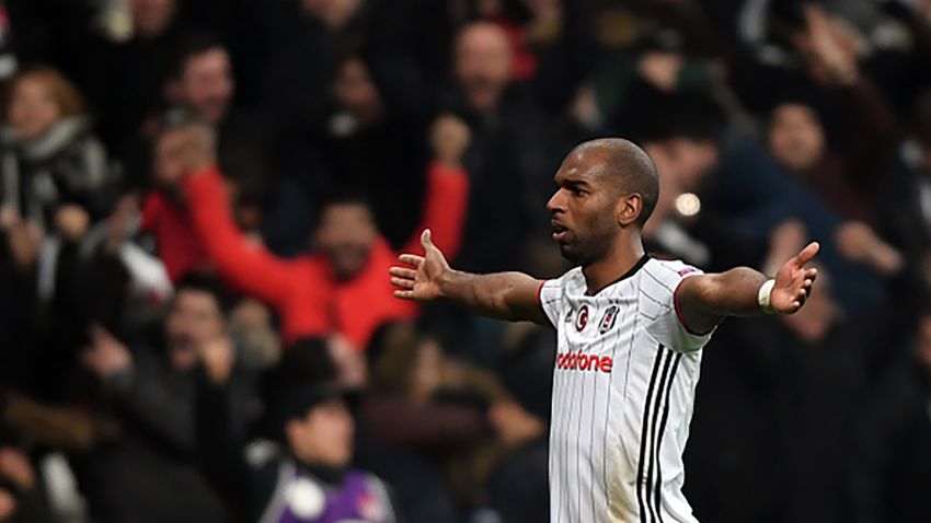 Besiktas' Ryan Babel celebrates after scoring a goal  during their UEFA Europa League round of 16 second leg football match between Besiktas JK and Olympiacos Piraeus on March 16, 2017 at the Vodafone arena stadium in Istanbul. / AFP PHOTO / BULENT KILIC        (Photo credit should read BULENT KILIC/AFP/Getty Images)
