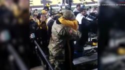 soldier proposes to girlfriend at game