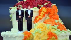 A wedding cake with statuettes of two men is seen during the demonstration in West Hollywood, California, May 15, 2008, after the decision by the California Supreme Court to effectively greenlight same-sex marriage. AFP PHOTO / GABRIEL BOUYS (Photo credit should read GABRIEL BOUYS/AFP/Getty Images)