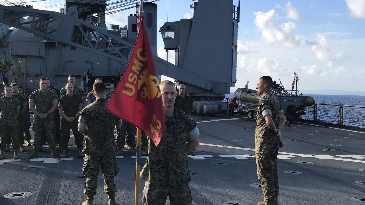 Lt. Jesse Schmitt of Palm Beach, Florida, is promoted to the rank of captain during a ceremony on the Ashland's deck.