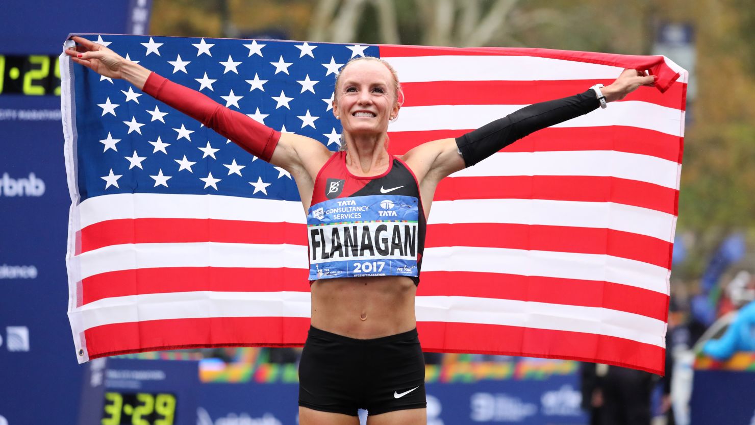 Shalane Flanagan celebrates her historic New York City Marathon victory on Sunday. 