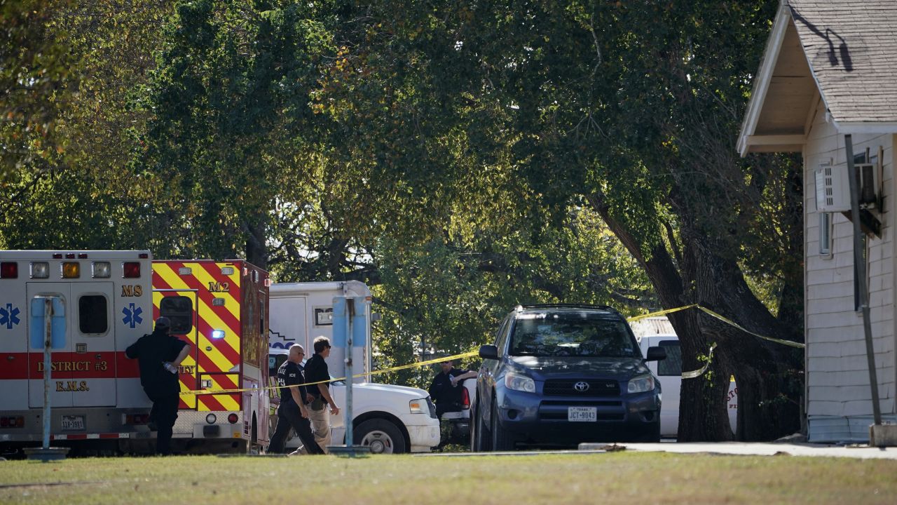 First responders work at the rear of the First Baptist Church of Sutherland Springs in response to a fatal shooting, Sunday, Nov. 5, 2017, in Sutherland Springs, Texas. (AP Photo/Darren Abate)