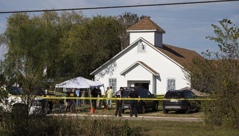 Investigators at the scene of a mass shooting at the First Baptist Church in Sutherland Springs, Texas, on Sunday, November 5, 2017. <a href="index.php?page=&url=http%3A%2F%2Fwww.cnn.com%2F2017%2F11%2F06%2Fus%2Fdevin-kelley-texas-church-shooting-suspect%2Findex.html" target="_blank">A man opened fire inside the small community church,</a> killing at least 25 people and an unborn child. The gunman, 26-year-old Devin Patrick Kelley, was found dead in his vehicle. He was shot in the leg and torso by an armed citizen, and he had a self-inflicted gunshot to the head, authorities said.
