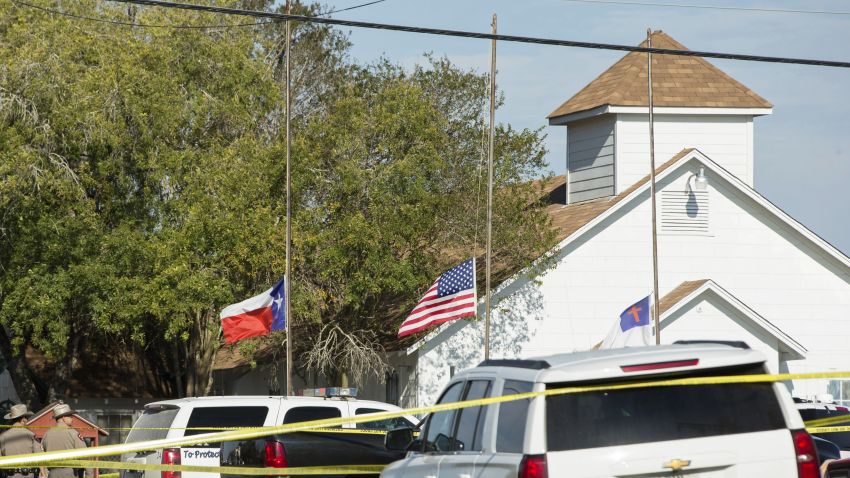 SUTHERLAND SPRINGS, TX - NOVEMBER 5:  Law enforcement officials gather near the First Baptist Church following a shooting on November 5, 2017 in Sutherland Springs, Texas. At least 20 people were reportedly killed and 24 injured when a gunman, identified as Devin P. Kelley, 26, allegedly entered the church during a service and opened fire.  (Photo by Erich Schlegel/Getty Images)