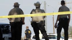 SUTHERLAND SPRINGS, TX - NOVEMBER 5:  Law enforcement officials gather near the First Baptist Church following a shooting on November 5, 2017 in Sutherland Springs, Texas. At least 20 people were reportedly killed and 24 injured when a gunman, identified as Devin P. Kelley, 26, allegedly entered the church during a service and opened fire.  (Photo by Erich Schlegel/Getty Images)